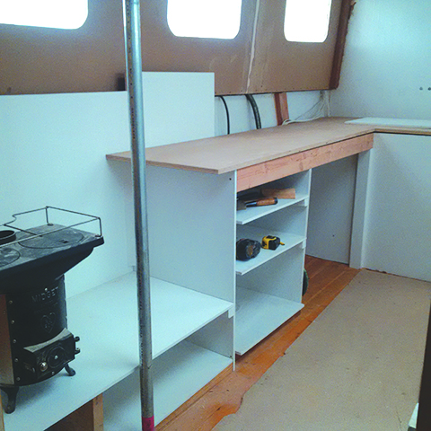 The galley begins to get installed.